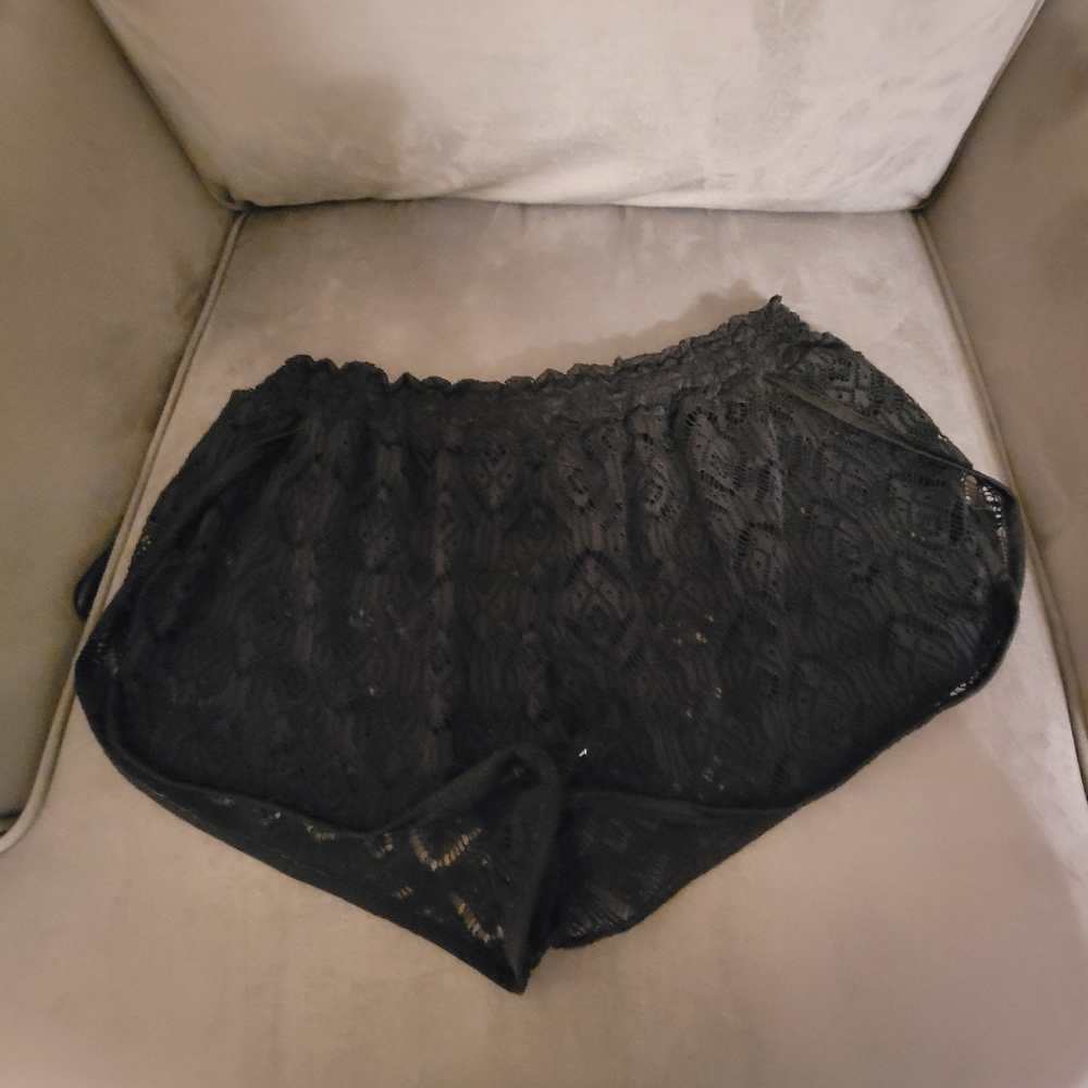 Sheer black lace unlined swim shorts